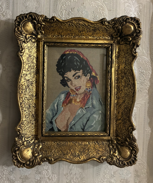 Woman with jewelry and a headscarf